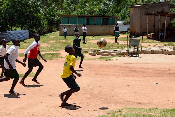 kenyan school children playing football